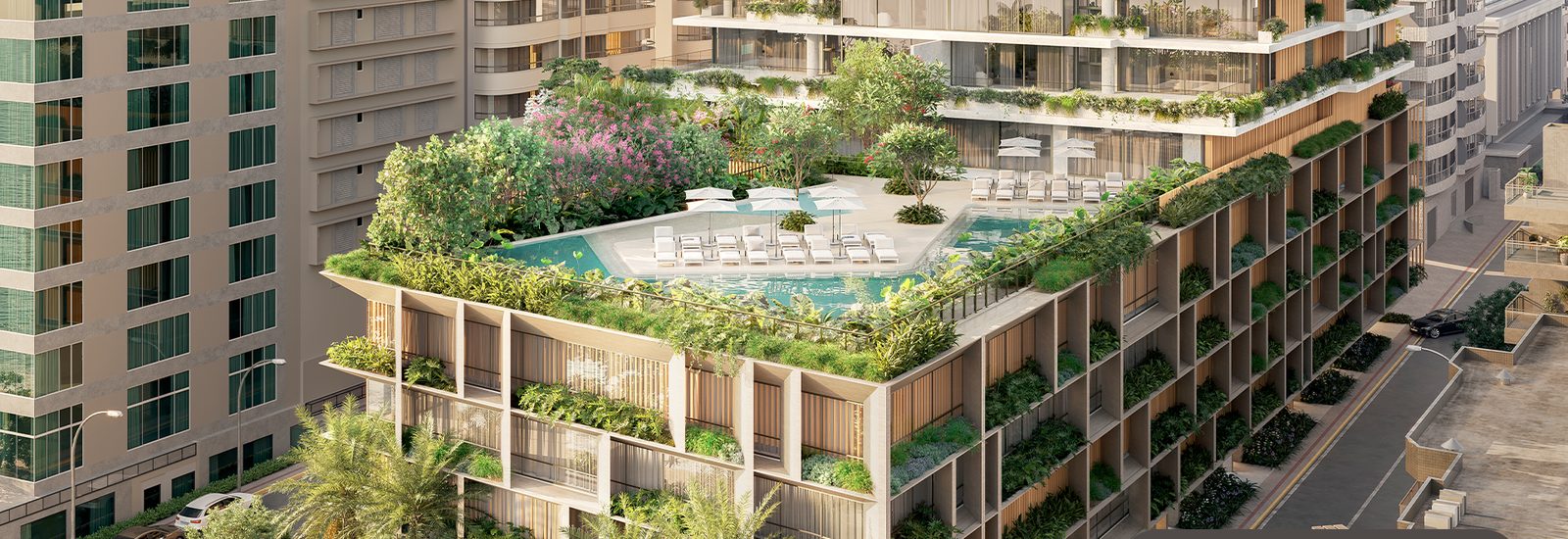 Área de lazer com piscina e paisagismo no Evidências Itapema